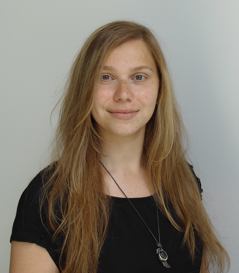 Head shot of Professor Aya Sakaya, a white woman with shoulder-length blonde hair.